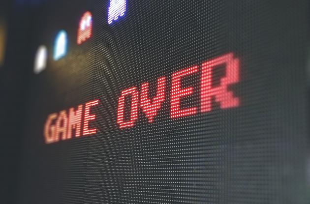 Computer game screen with the text "game over"