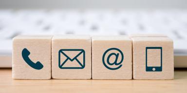 Wooden blocks with symbols on means of communication